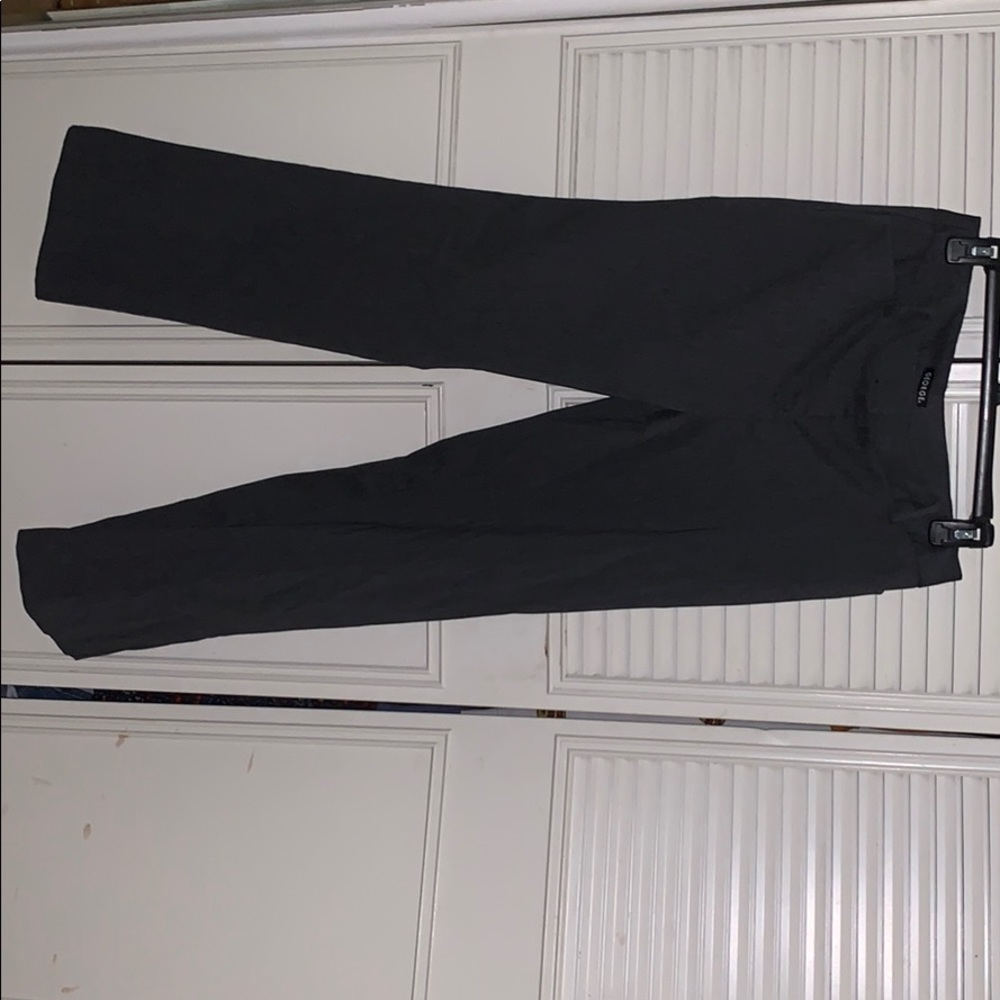 Dark grey pants suit.